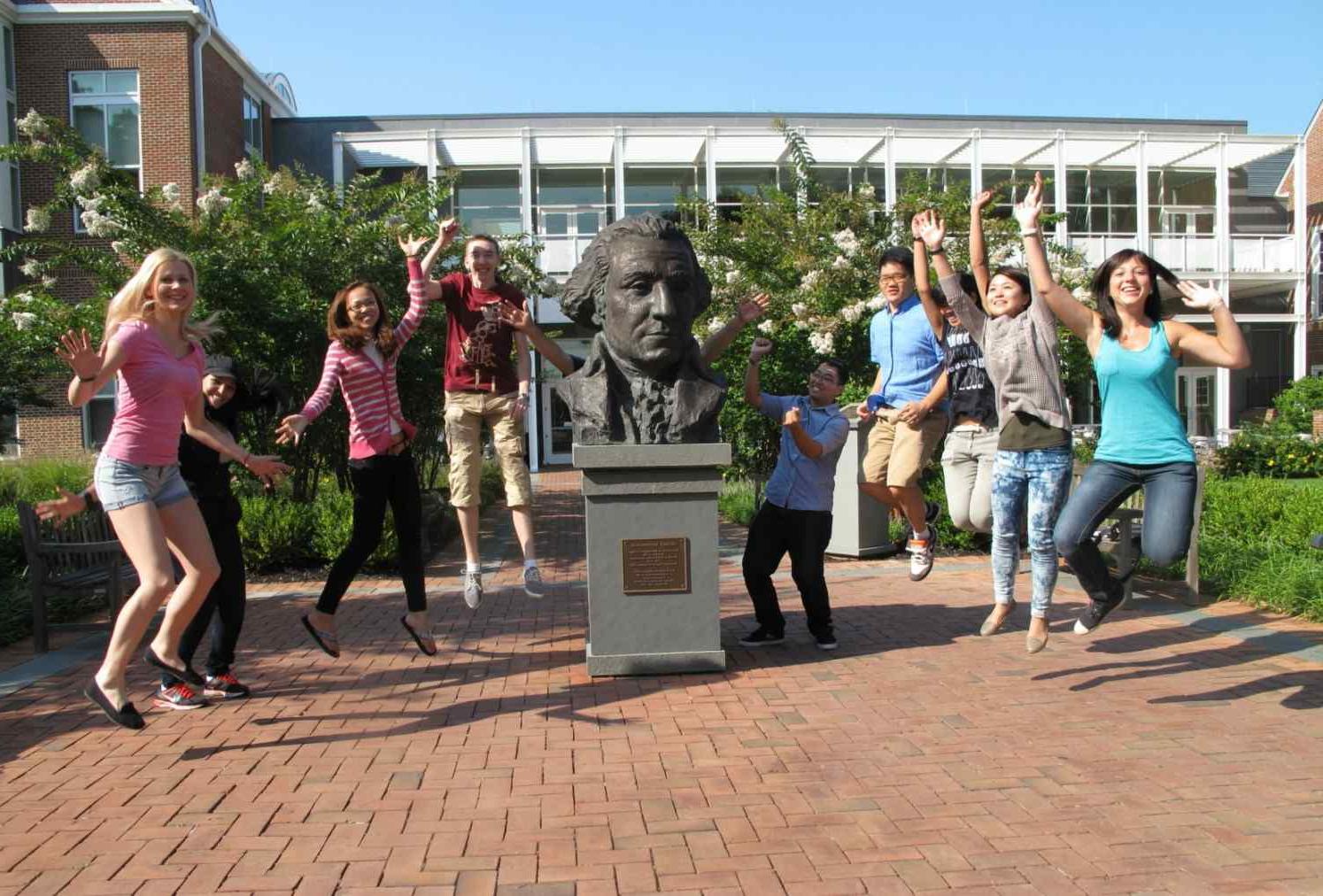 A group of students jumping in the air